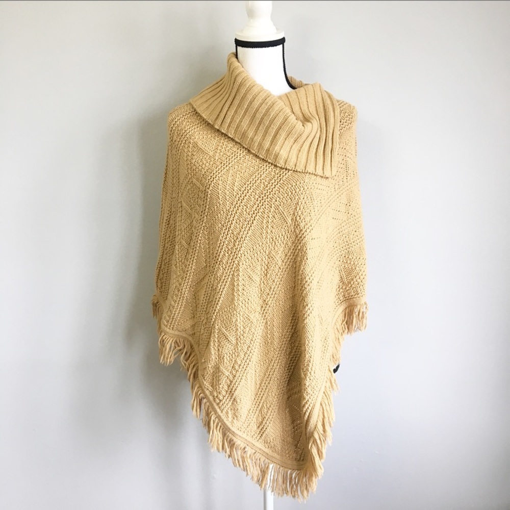 Knit turtleneck fringed poncho
